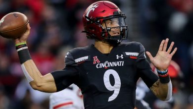 Undefeated Cincinnati joins Georgia, Ohio State and Alabama in CFP's coveted top 4 as Oregon slips