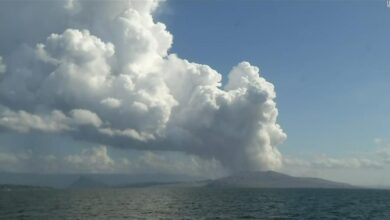 Philippine volcano: Authorities evacuate thousands as Taal spews mile-high plume