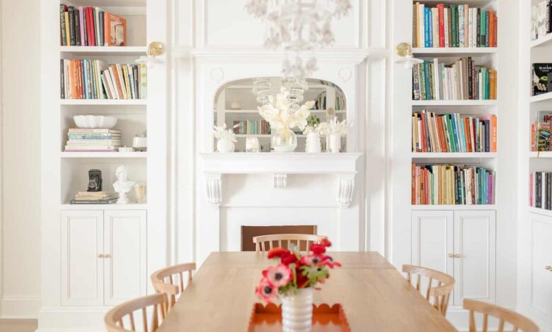 dining room with built-in bookshelves