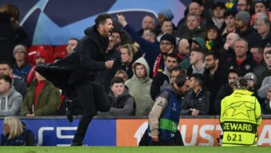 Man United open investigation to identify fan throwing objects at Diego Simeone