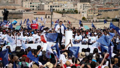 Macron Vows Ambitious Green Policies, Wooing the Left in Runoff