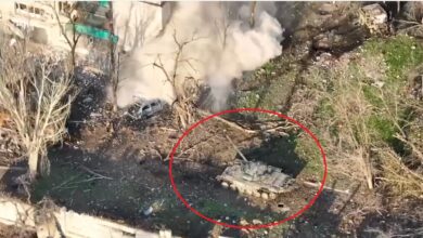 Russian tank destroy apartment buildings in Mariupol
