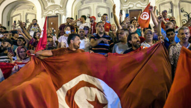 Tunisians adopt a new Constitution that reduces democracy