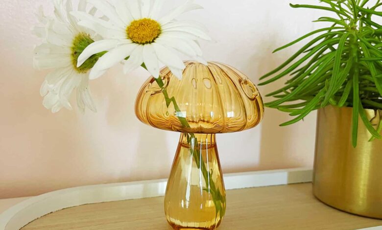 glass mushroom vases with fresh flowers