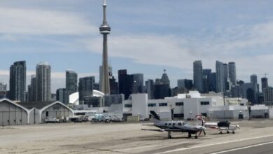 Toronto island airport: Suspicious device found has been disarmed, authorities say. 2 people are in custody