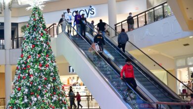 Consumers are cutting back on holiday gift buying amid higher inflation