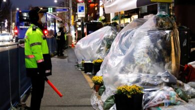 Itaewon crush: South Korean police officers arrested over deadly Halloween tragedy