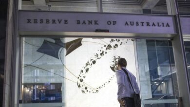 Australia's central bank signals more tightening ahead after hiking rates to decade high