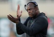 Michigan State tells suspended football coach Mel Tucker it plans to fire him