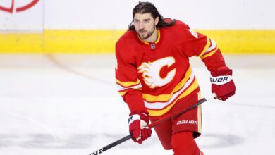 Flames’ Tanev misses most of game after hit from Avalanche’s Colton
